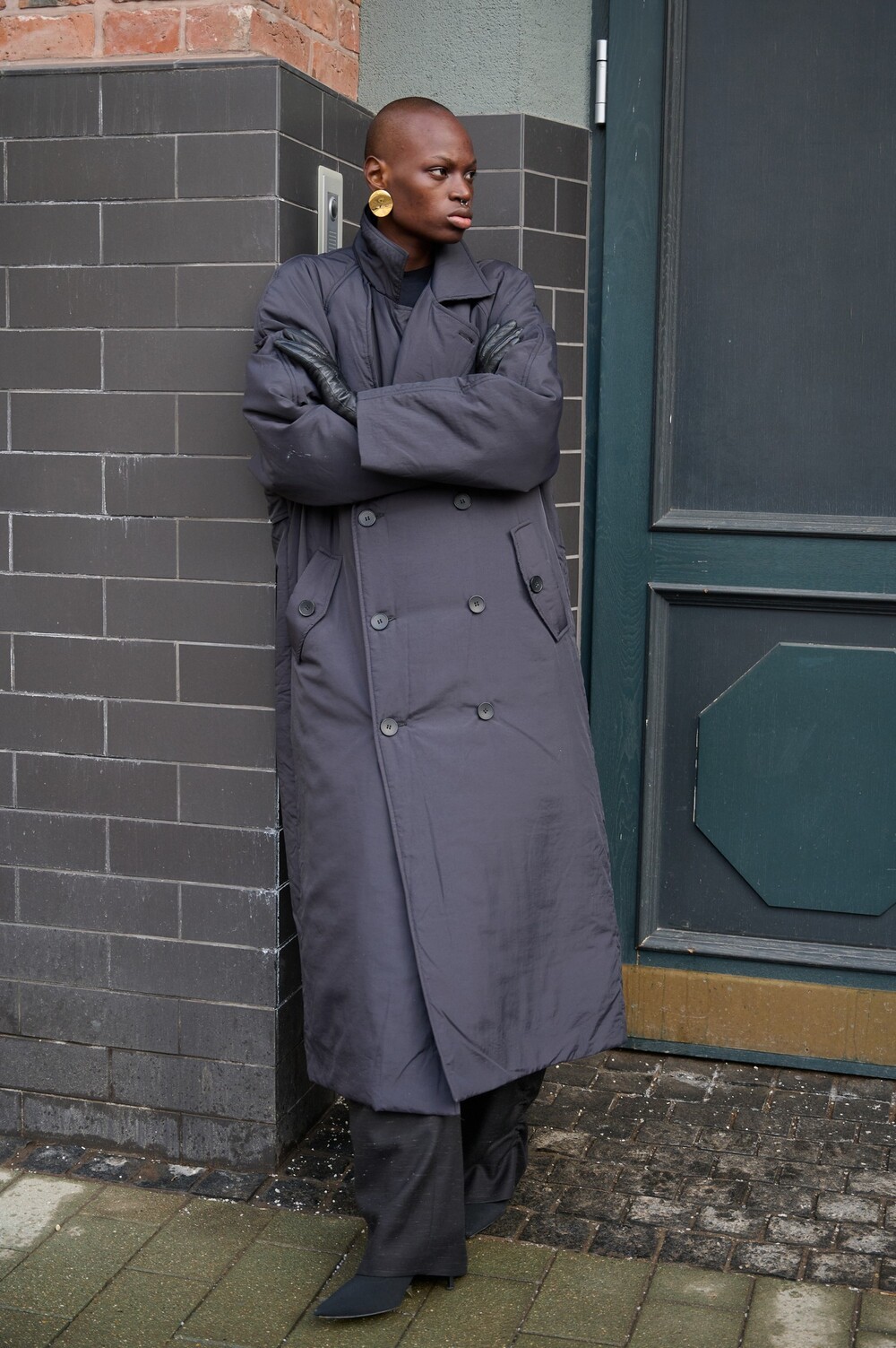 Insulated coat made of raincoat fabric